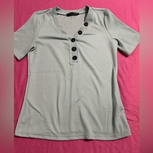 Merokeety size medium light teal ribbed shirt